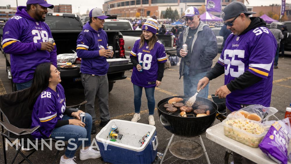 Minnesota Vikings fans tailgating and grilling before a game.