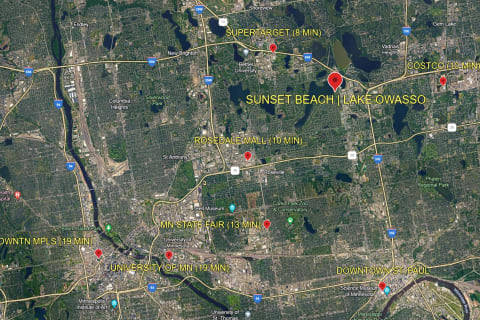 Aerial map of the Twin Cities area showing Sunset Beach at Lake Owasso and nearby points of interest.