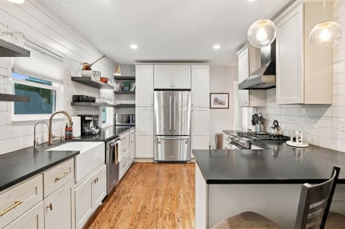 Your gourmet kitchen awaits with sleek stainless appliances, spacious counters, and a welcoming island—perfect for preparing meals and gathering with loved ones in effortless style.