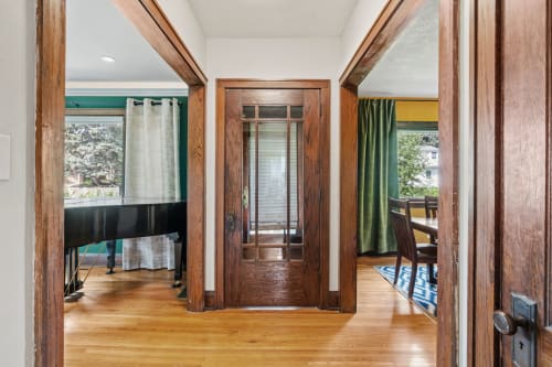 You'll love the warm wood details and gleaming hardwood floors that welcome you into this thoughtfully designed space.