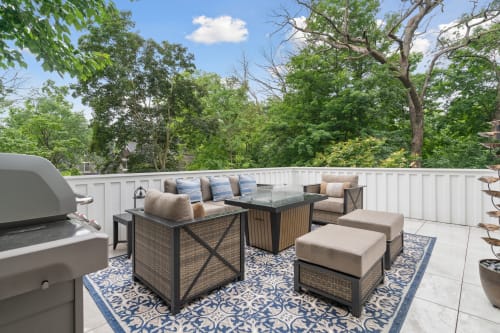 Your private terrace sanctuary awaits with plush seating, dining space, and BBQ grill—perfect for morning coffee or evening gatherings.